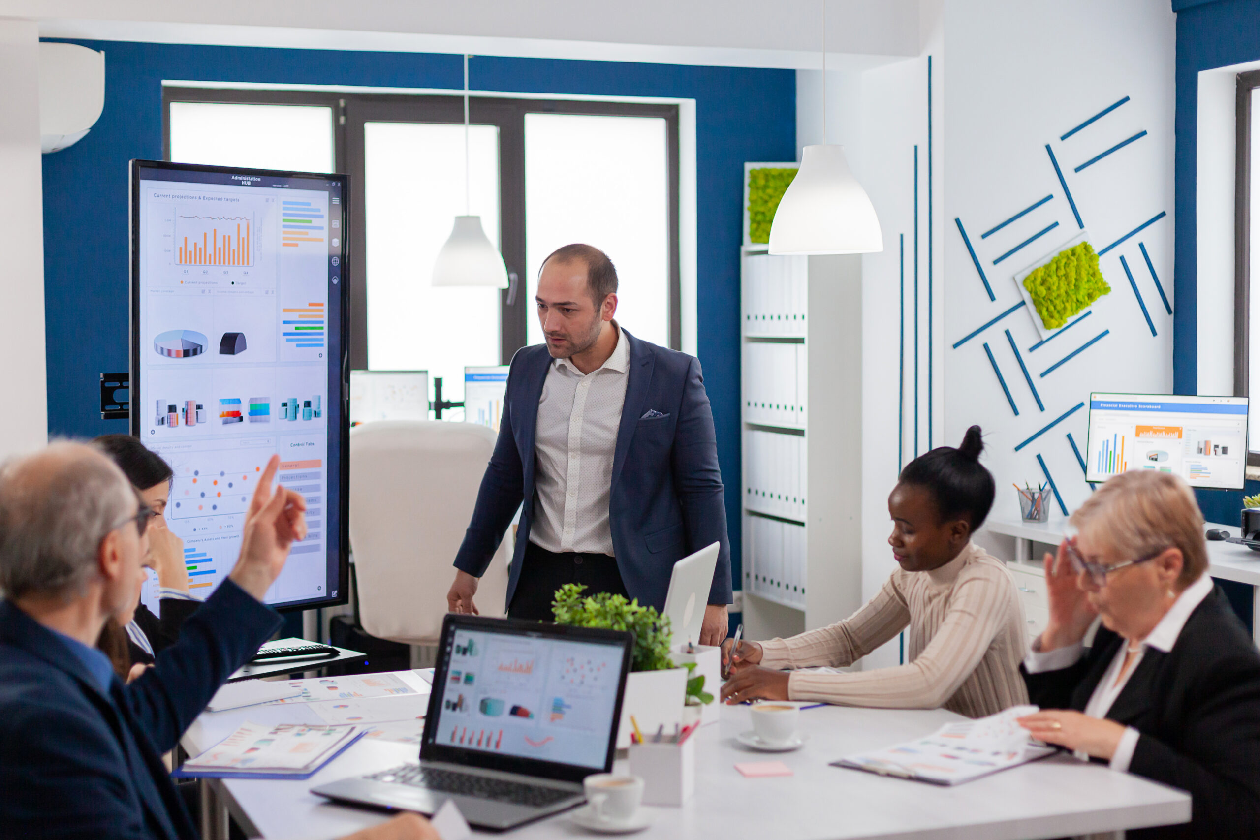 Angry screaming executive corporate in conference meeting room